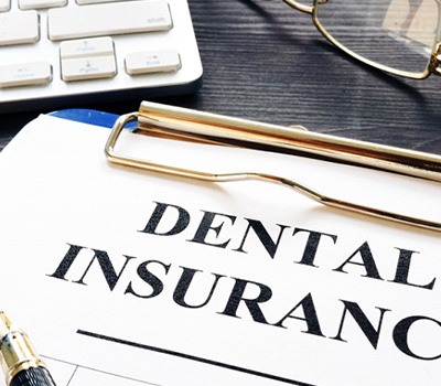 Dental insurance form on a table