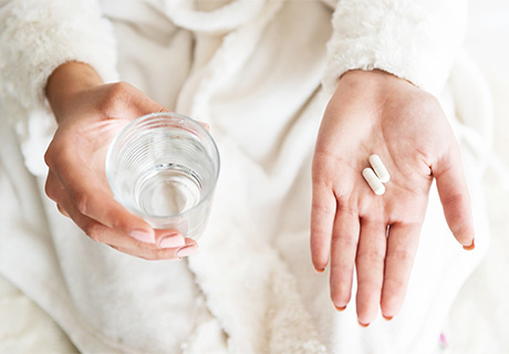 Closeup of pain medication after dental implant surgery in Mayfield Heights