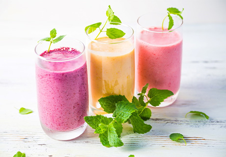 Colorful smoothies to drink after dental implant surgery in Mayfield Heights 