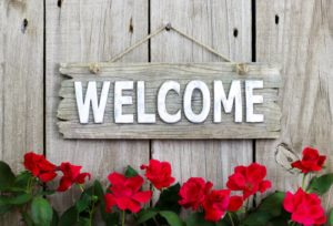 rustic welcome sign greeting patients of periodontist in Mayfield Heights